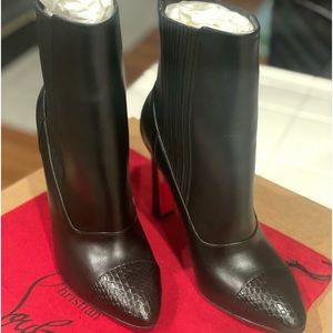 Christian Louboutin ankle boots.